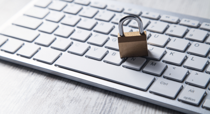 Computer keyboard with padlock on top