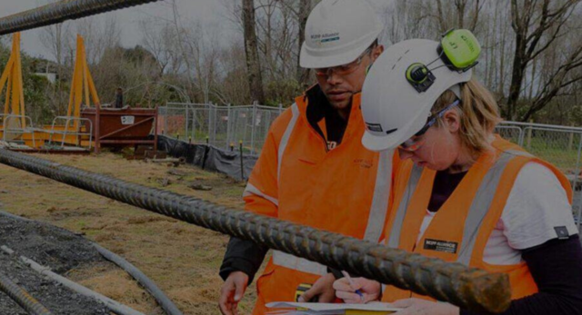 Two health and safety professionals on a construction site