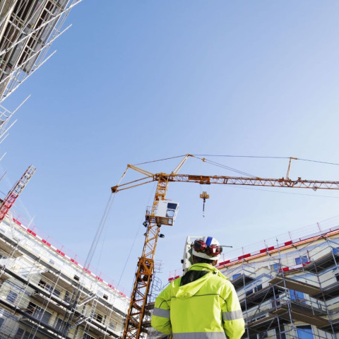 Construction site with man in jacket