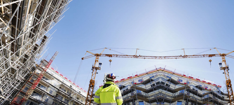 Construction site with man in jacket