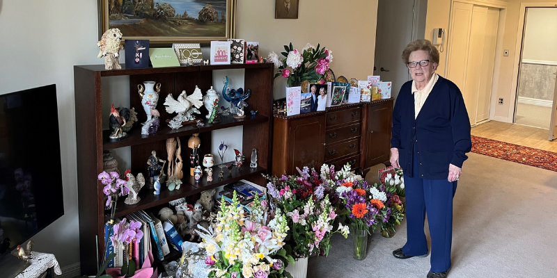 Irene with her flowers and cards