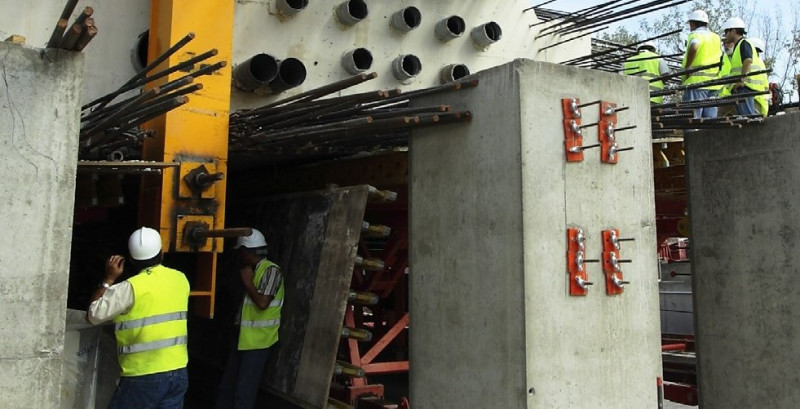 Construction workers on building site  